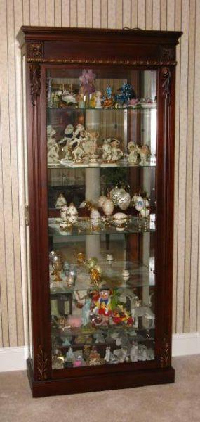 Appraisal: Lighted Display Collector's Cabinet mirrored back glass front and shelves