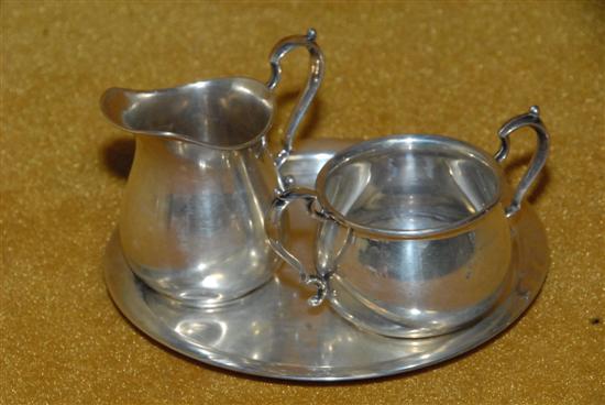 Appraisal: FISHER STERLING SILVER SUGAR AND CREAMER SET on a circular