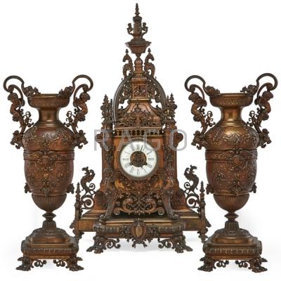 Appraisal: FRENCH CLOCK SET Two metal vases and mantle clock time