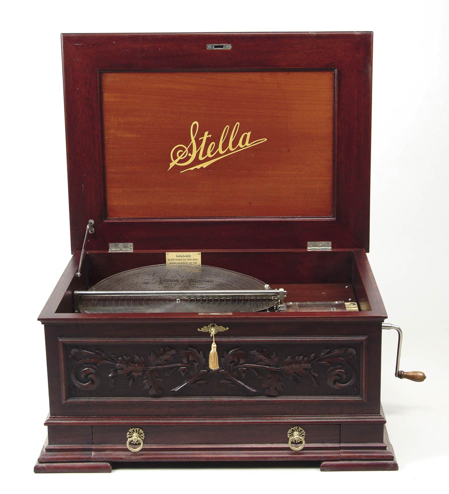 Appraisal: STELLA TABLETOP DISC MUSIC BOX Mahogany case with lift top