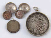 Appraisal: An American dollar loose mounted as a pendant and a