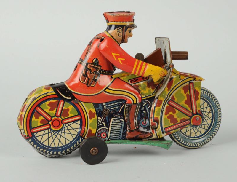 Appraisal: Marx Wind-up Policeman on Motorcycle This Marx motorcycle policeman has