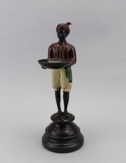 Appraisal: Bronze Painted Figure Holding Tray Painted blackamoor figure holding tray