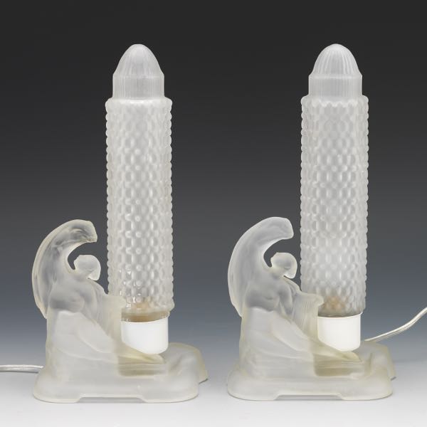 Appraisal: PAIR OF ART DECO FROSTED GLASS FIGURAL BOUDOIR LAMPS Pair