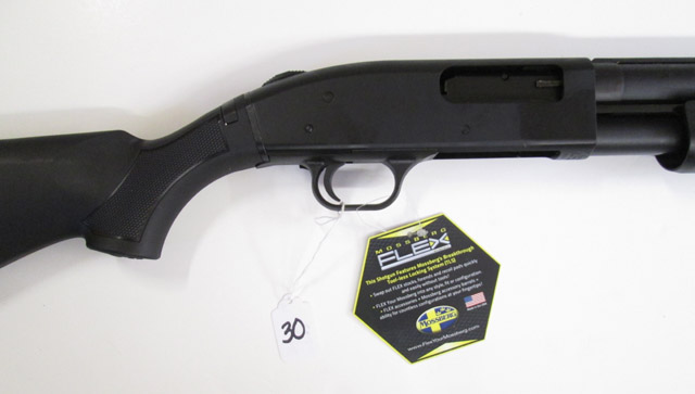 Appraisal: MOSSBERG MODEL FLEX SLIDE ACTION SHOTGUN gauge vent rib barrel