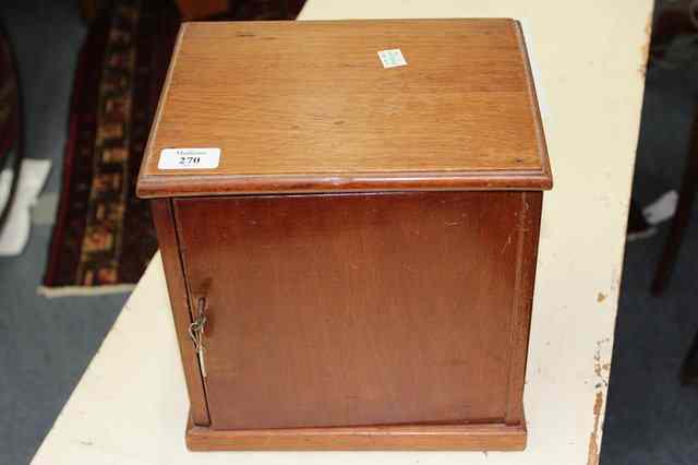 Appraisal: AN EARLY TH CENTURY MAHOGANY COIN COLLECTORS CABINET the door