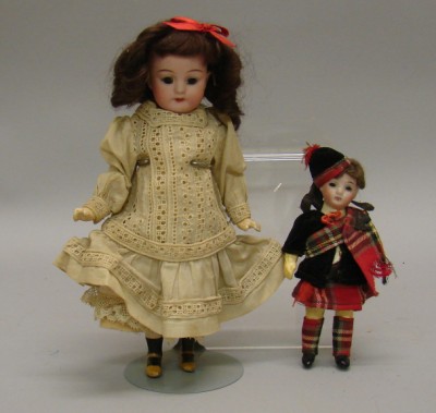 Appraisal: Pair of dolls DEP S H Germany Stationary brown eyes