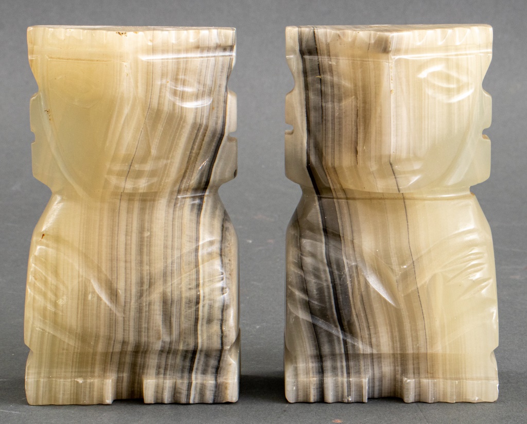 Appraisal: MID-CENTURY MODERN MAYAN STYLE ONYX BOOKEND Pair of Mid-Century Modern