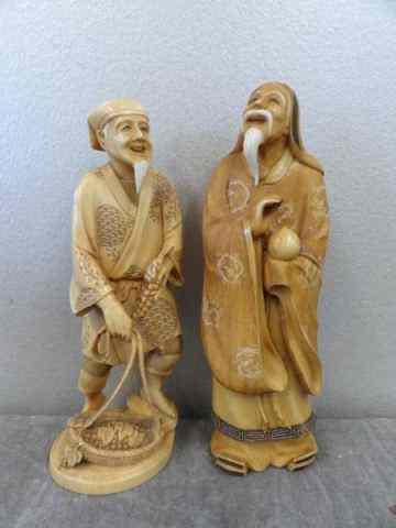 Appraisal: Signed Asian Ivories A man with white beard holding a