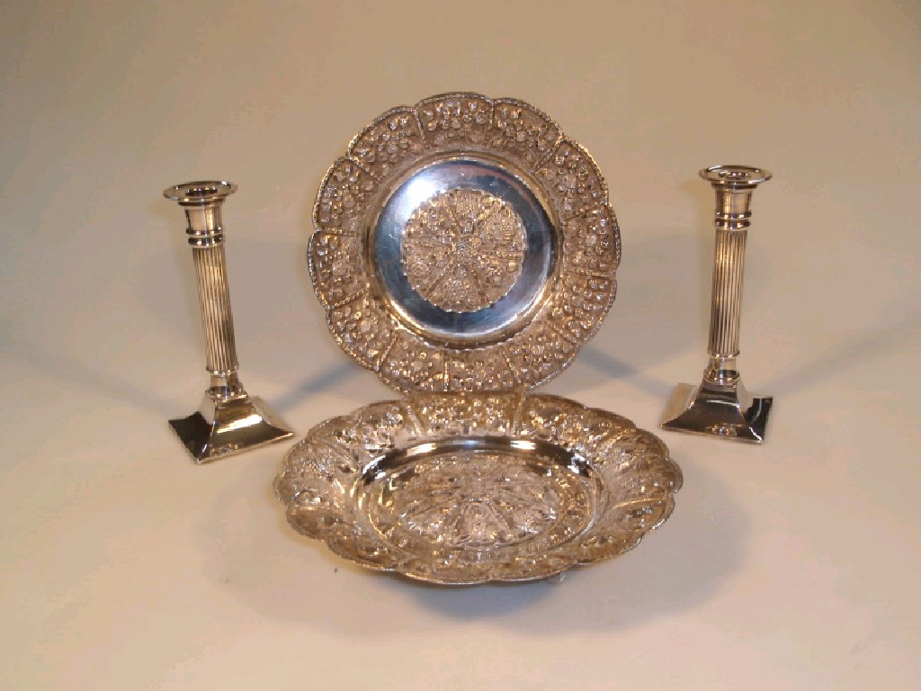 Appraisal: A pair of electroplate circular dishes each with embossed panels