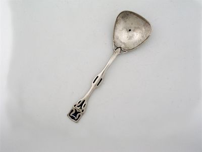 Appraisal: An art nouveau spoon with grain shovel bowl with panels