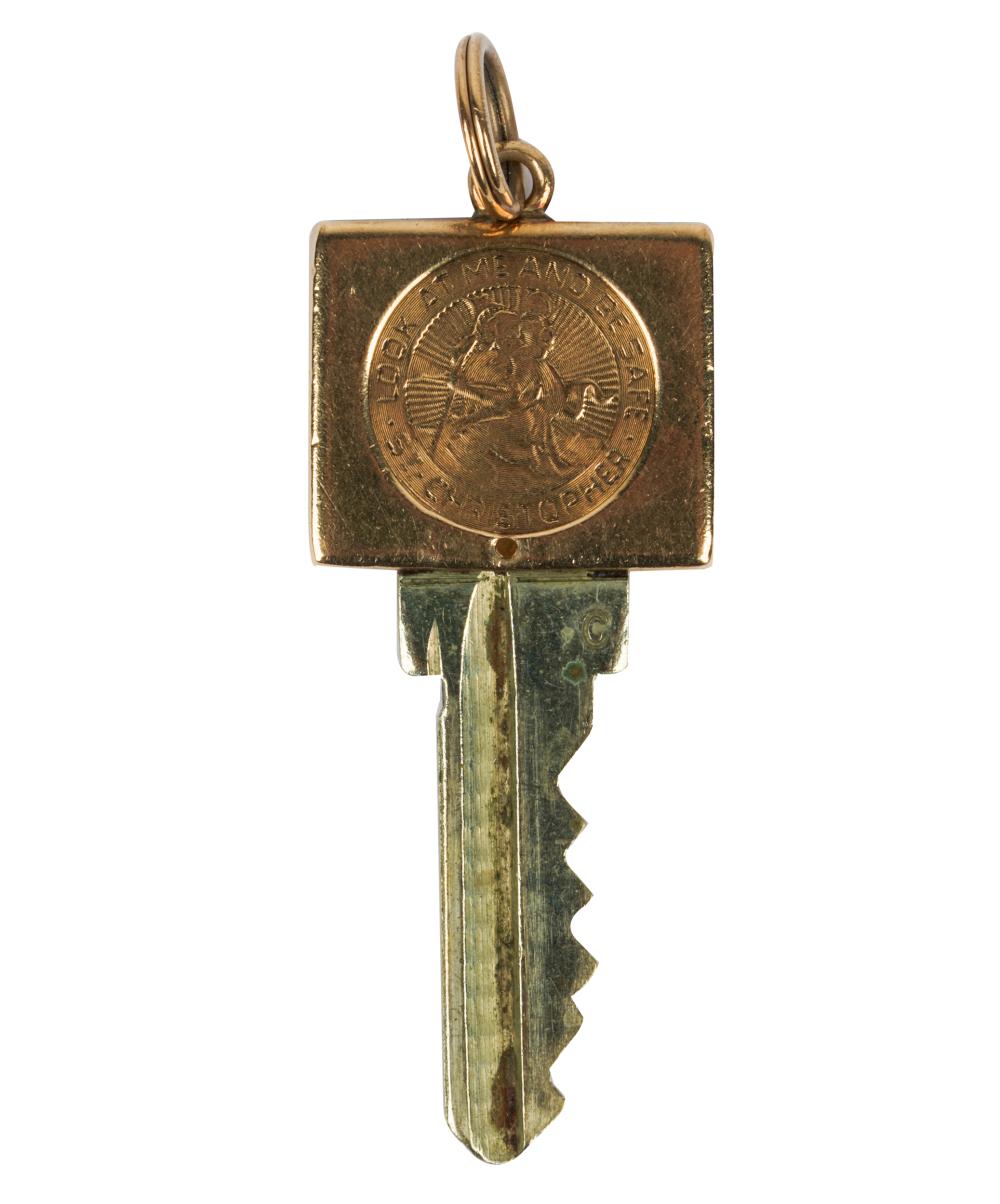 Appraisal: KARAT YELLOW GOLD METAL KEY PENDANTInscribed Look at me and