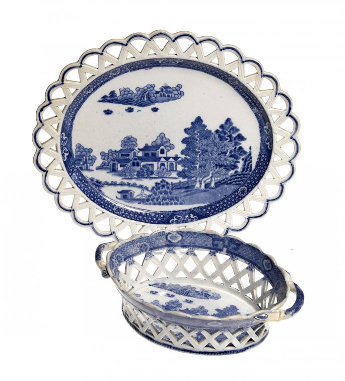 Appraisal: A SPODE RETICULATED AND BLUE PRINTED PEARLWARE FOREST LANDSCAPE PATTERN