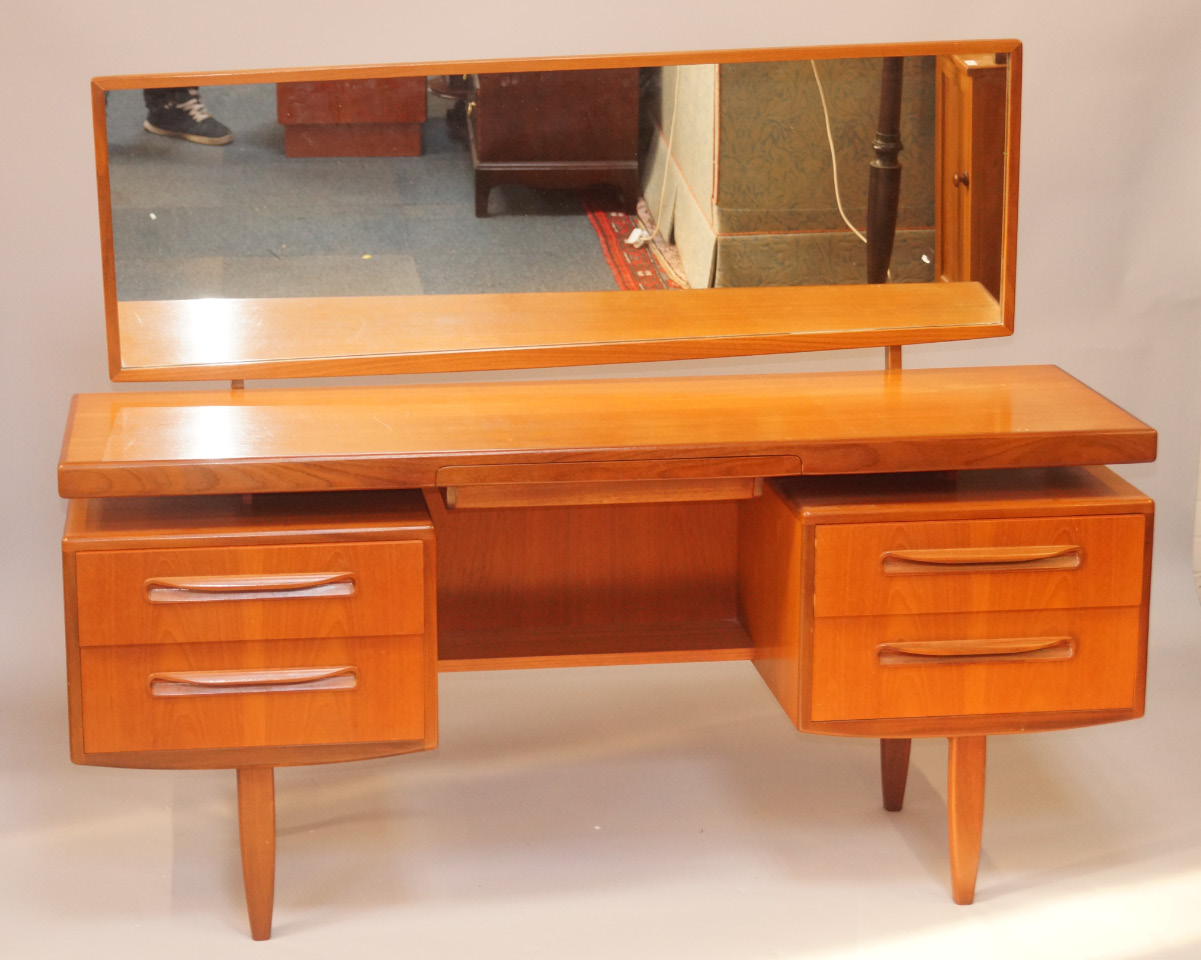 Appraisal: A G-Plan teak retro style dressing table with an arrangement