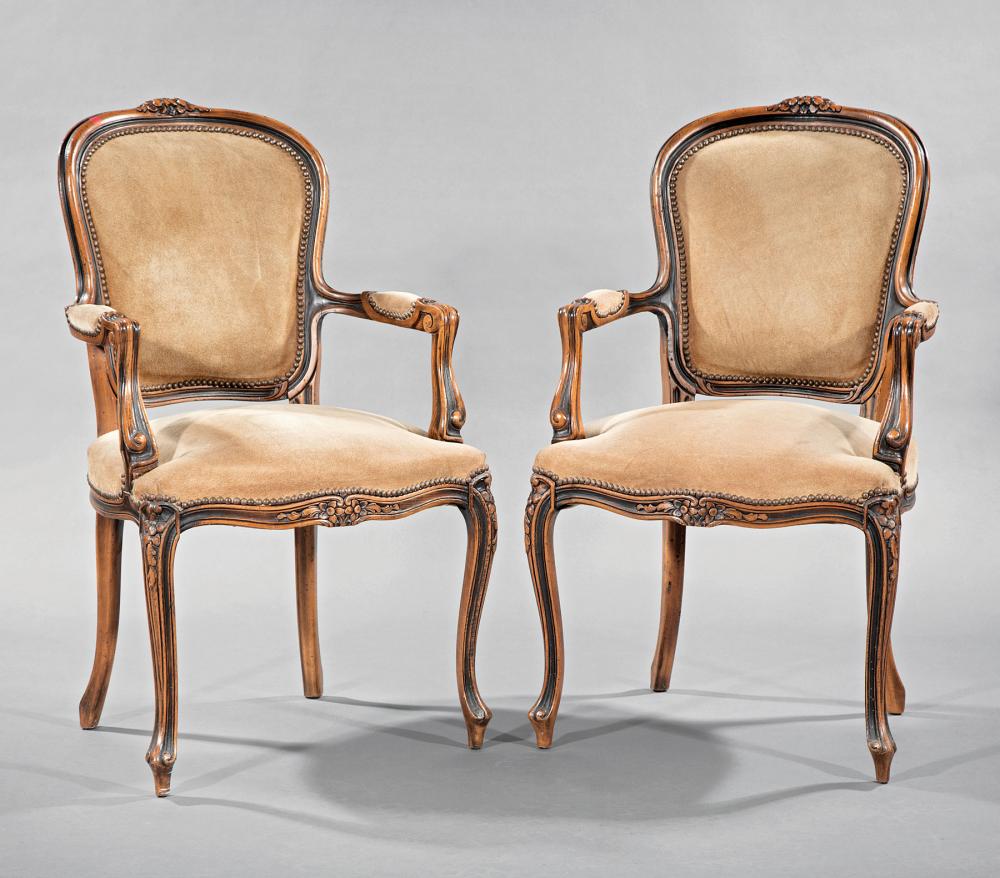 Appraisal: Pair of Louis XV-Style Carved Walnut Fauteuils th c molded