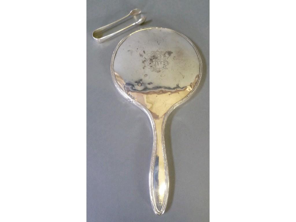 Appraisal: LADY'S PLAIN SILVER BACKED HAND MIRROR with fine bead edge