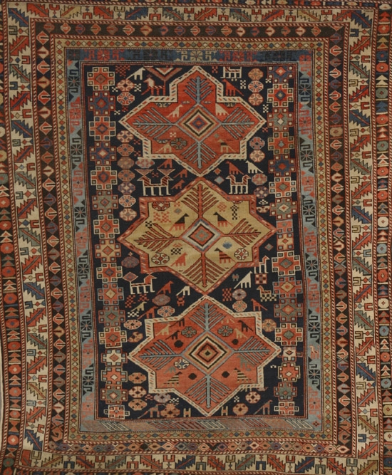 Appraisal: Shirvan Rug Circa Blue ground with rosette and animal field