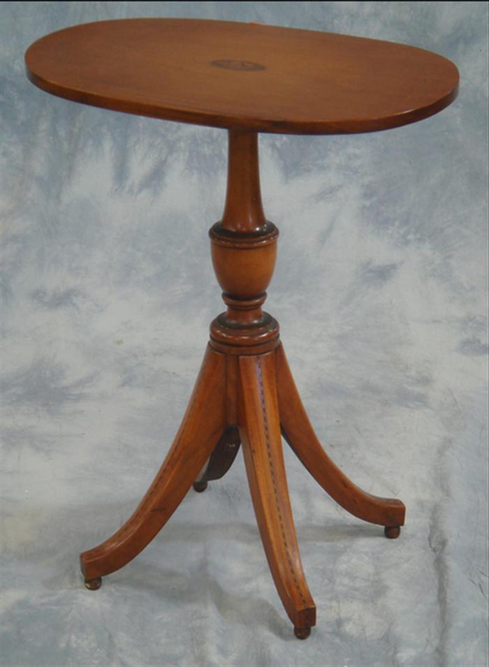 Appraisal: Shell inlaid mahogany candle stand with oval top l x