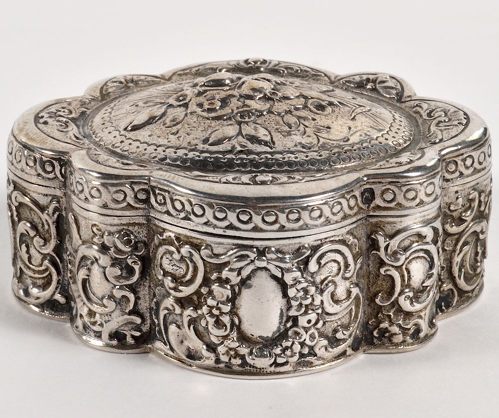 Appraisal: Continental Silver Repousse Box Rounded octagonal silver box with hinged