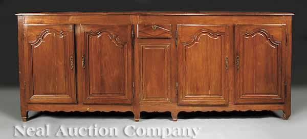 Appraisal: An Antique Louis XV Carved Cherrywood Buffet Bas molded top