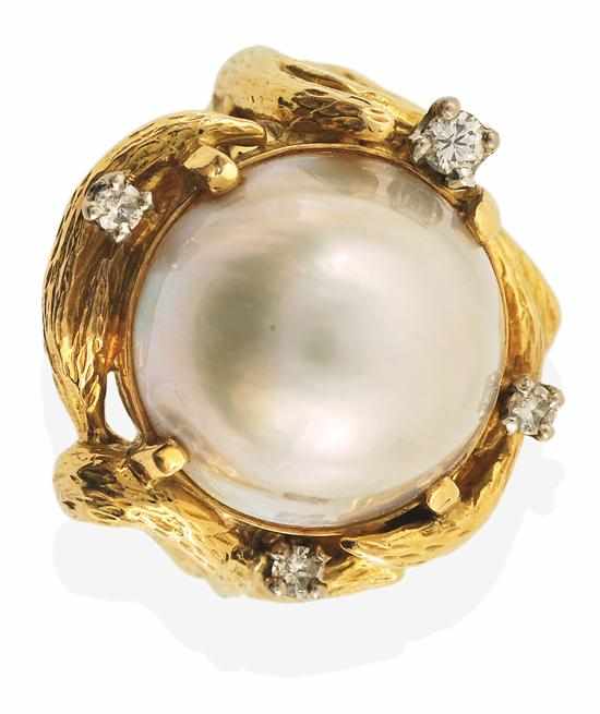 Appraisal: A MABE PEARL AND DIAMOND RING Centrally set with a