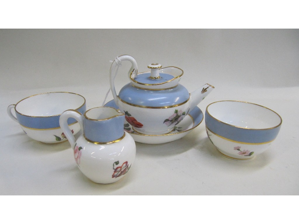 Appraisal: Derby tea for one painted with flowers on a white