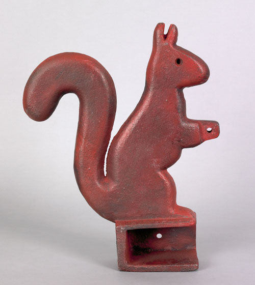 Appraisal: Cast iron squirrel form windmill weight ca attributed to the