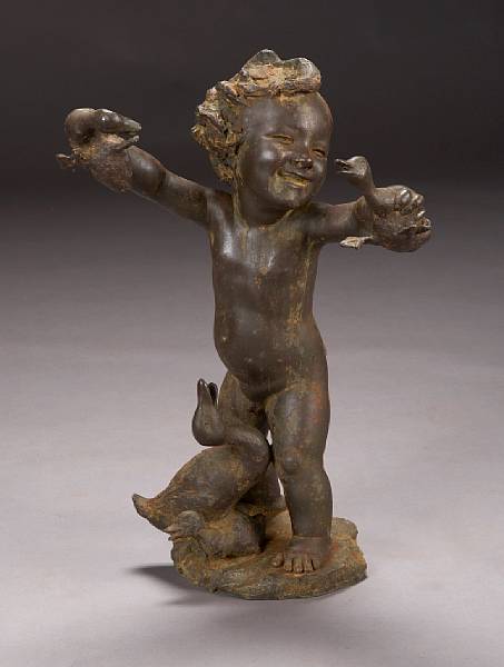 Appraisal: A patinated bronze putto form fountainhead The gleeful child playing