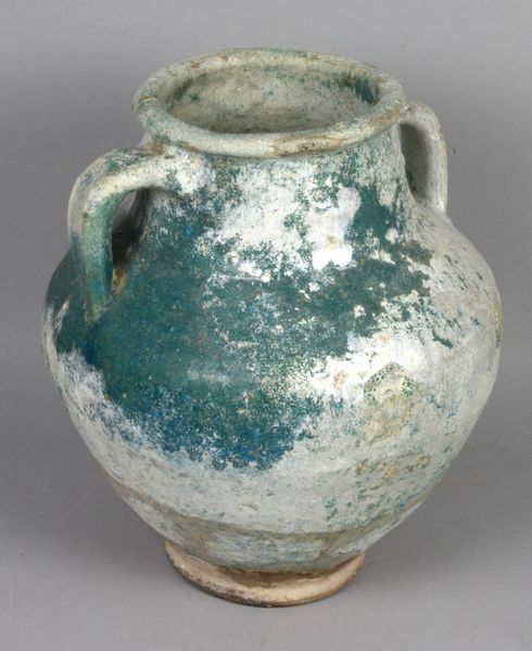 Appraisal: th- th Century Persian terracotta storage jar having turquoise glaze