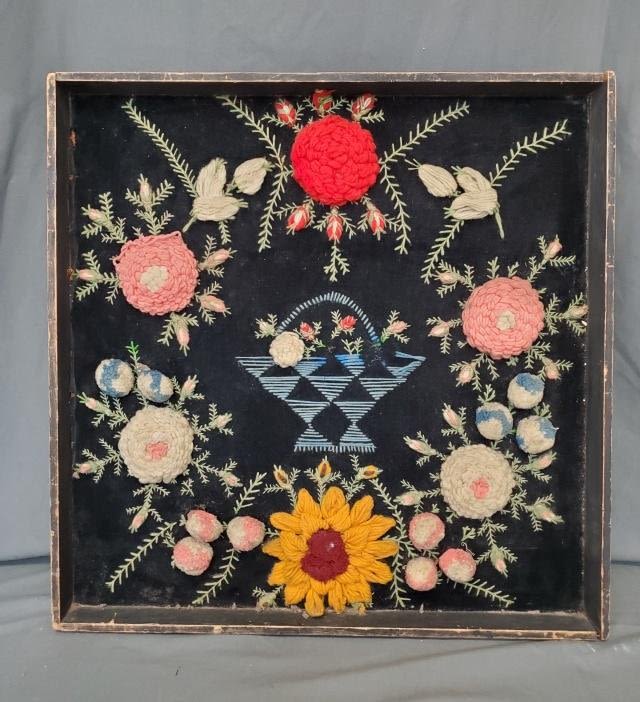 Appraisal: Antique crewel embroidered and plush work needlework picture with basket