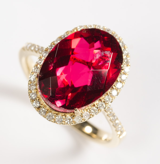 Appraisal: RED BERYL DOUBLET AND DIAMOND RING k yellow gold with