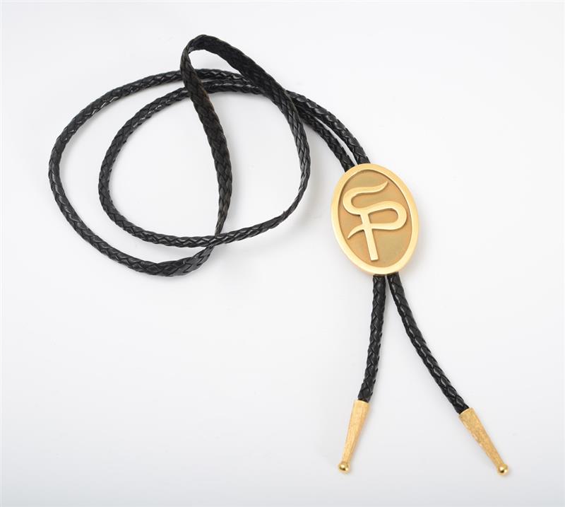 Appraisal: K GOLD BOLO TIE With initials 'SP' on the oval-shaped