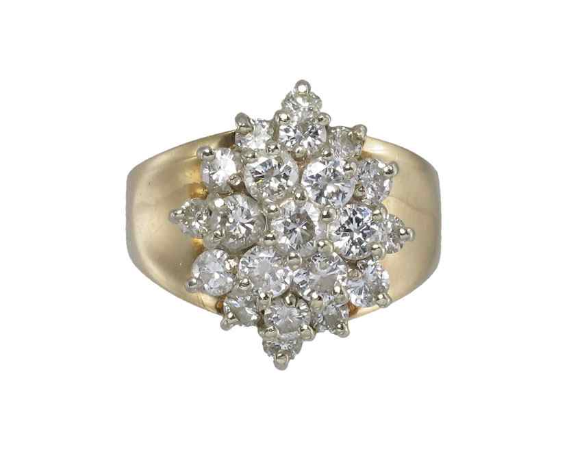 Appraisal: K CTW DIAMOND FASHION RING K yellow gold ring contains