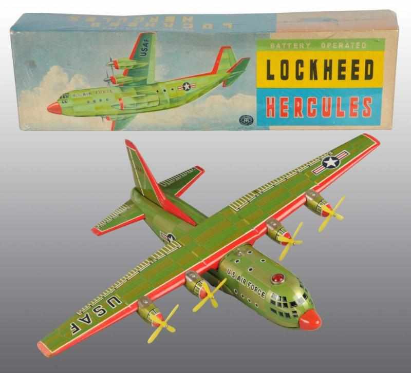 Appraisal: Tin Lockheed Hercules Airplane Battery-Op Toy Description Japanese Working Made