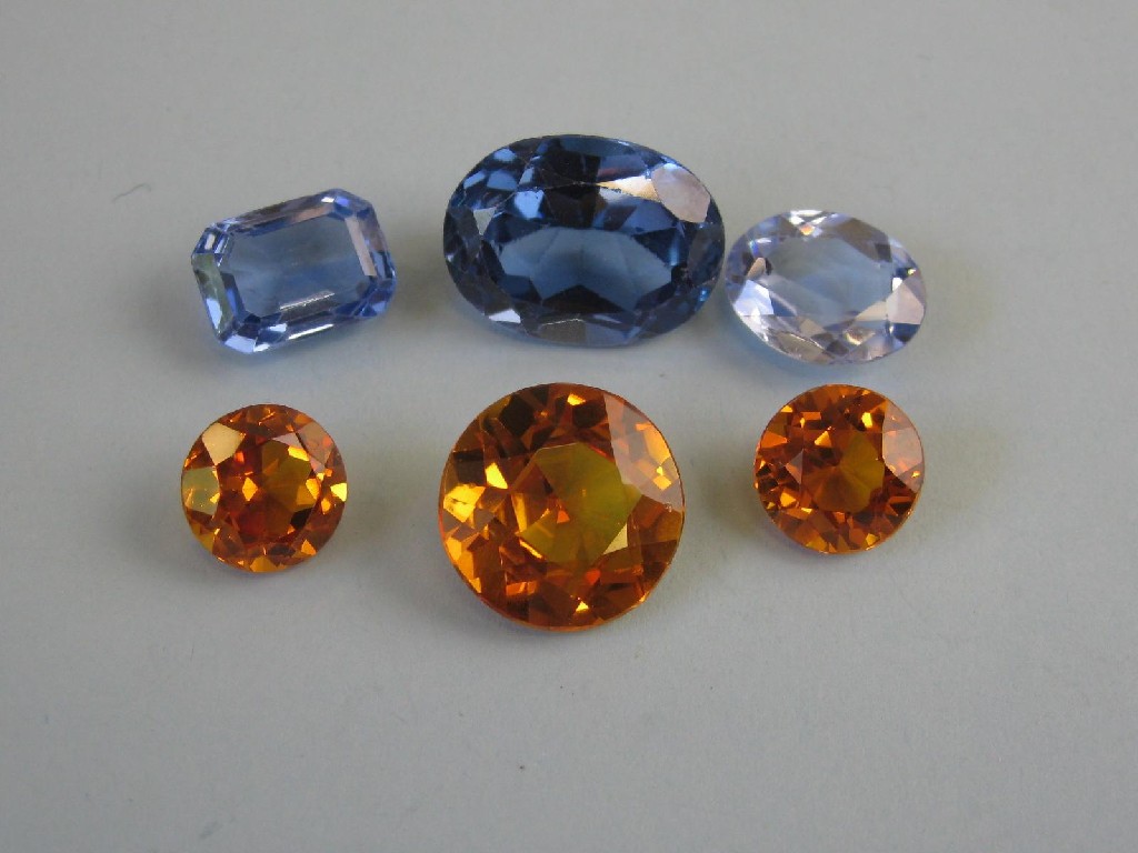 Appraisal: Three unmounted blue Topaz stones and three citrines