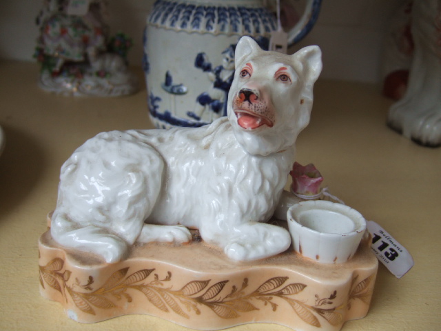 Appraisal: A German porcelain inkwell th century modelled as a white