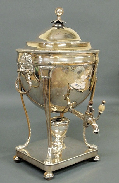 Appraisal: Sheffield silverplate hot water urn with a ball finial lion