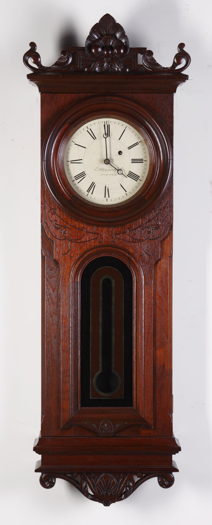 Appraisal: E Howard Boston Wall Clock Carved incised walnut case with