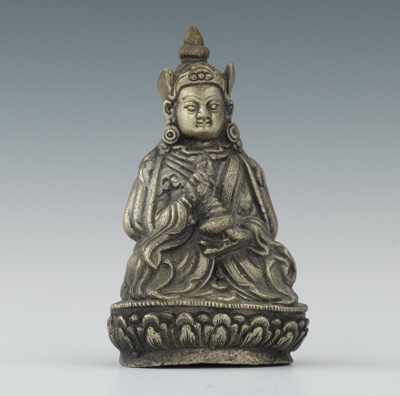 Appraisal: A Silvered Bronze Seated Figure Tibetan ca th Century Apprx