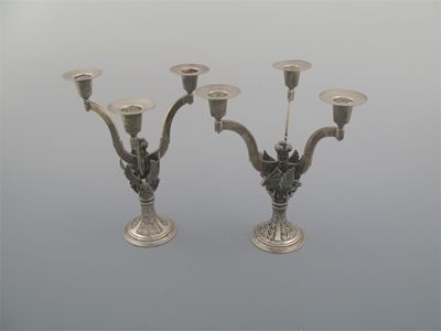 Appraisal: Two modern cast limited edition parcel-gilt three light candelabra commemorating