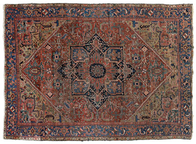 Appraisal: Heriz rug star-shaped central medallion on faded red ground ft