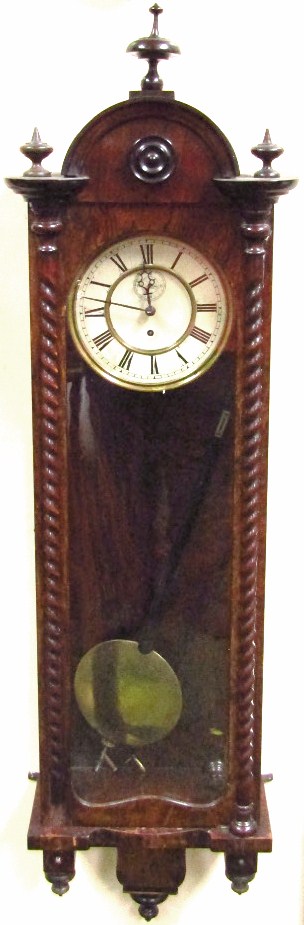 Appraisal: A thC painted walnut cased Vienna wall clock with circular