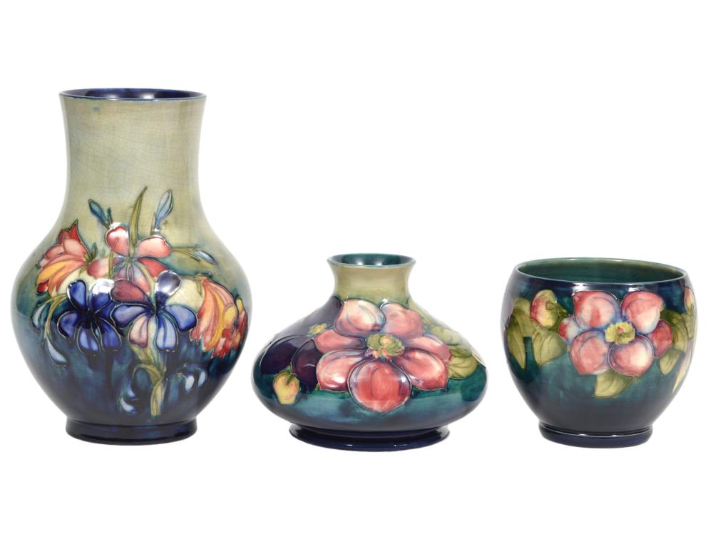 Appraisal: MOORCROFT POTTERY VASES IN FLORAL PATTERNSMoorcroft vase in 'Spring Flowers'