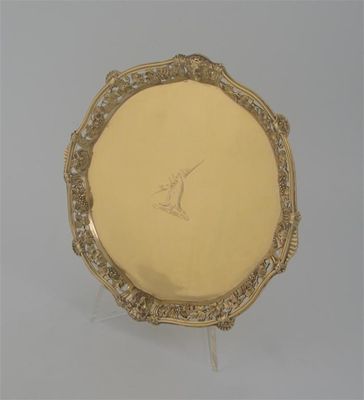 Appraisal: A George II cast silvergilt salver of shaped circular outline