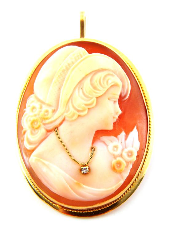 Appraisal: JEWELRY cameo brooch or locket pendant woman wearing jeweled necklace