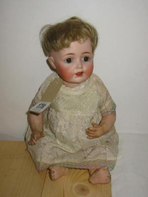 Appraisal: A J D Kestner bisque headed character doll with brown