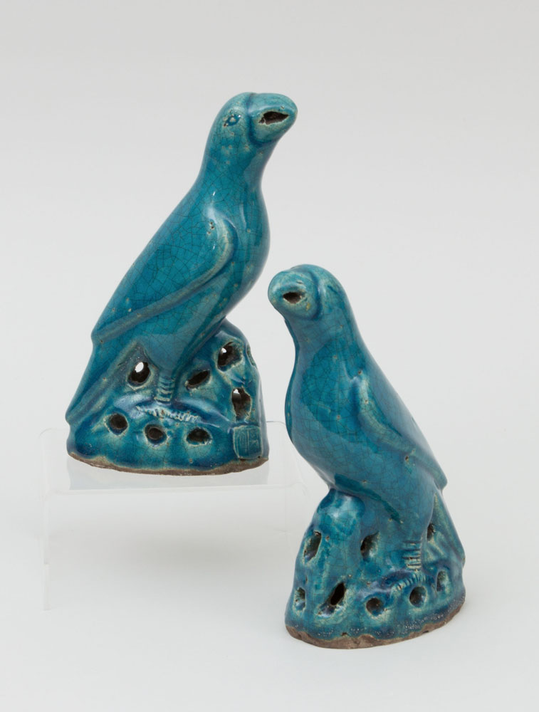 Appraisal: PAIR OF MODERN CHINESE TURQUOISE-GLAZED POTTERY FIGURES OF PARROTS x