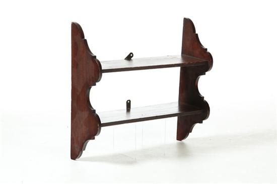 Appraisal: HANGING SHELF American th century poplar Cutout scalloped sides and