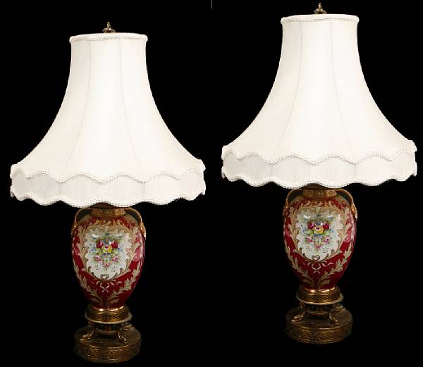 Appraisal: A pair of gilt metal mounted porcelain table lamps height