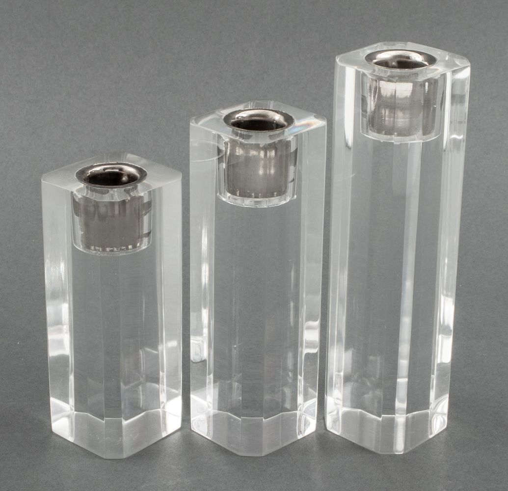 Appraisal: MODERN GRADUATED LUCITE CANDLESTICK HOLDERS Three Modern lucite candlestick holders